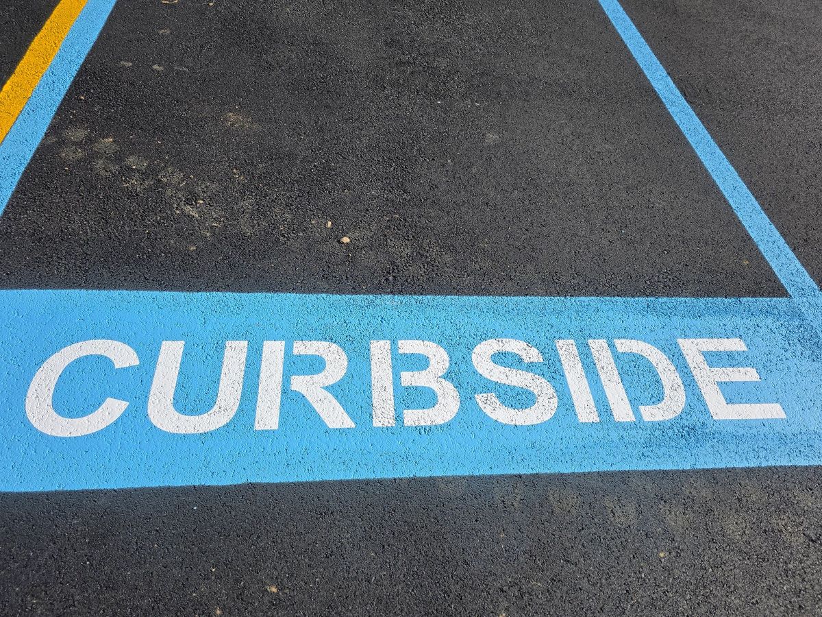 White CURBSIDE stencil in a blue painted box